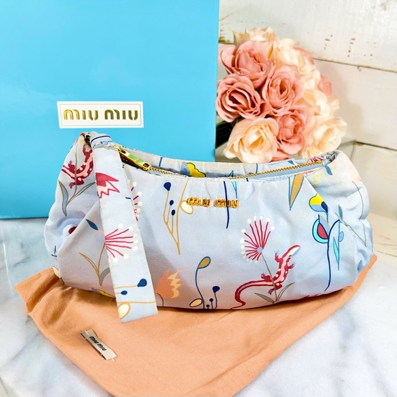 Miu Miu Handbags - Miu Miu Baby Blue Silk Lined Clutch/Cosmetic Bag